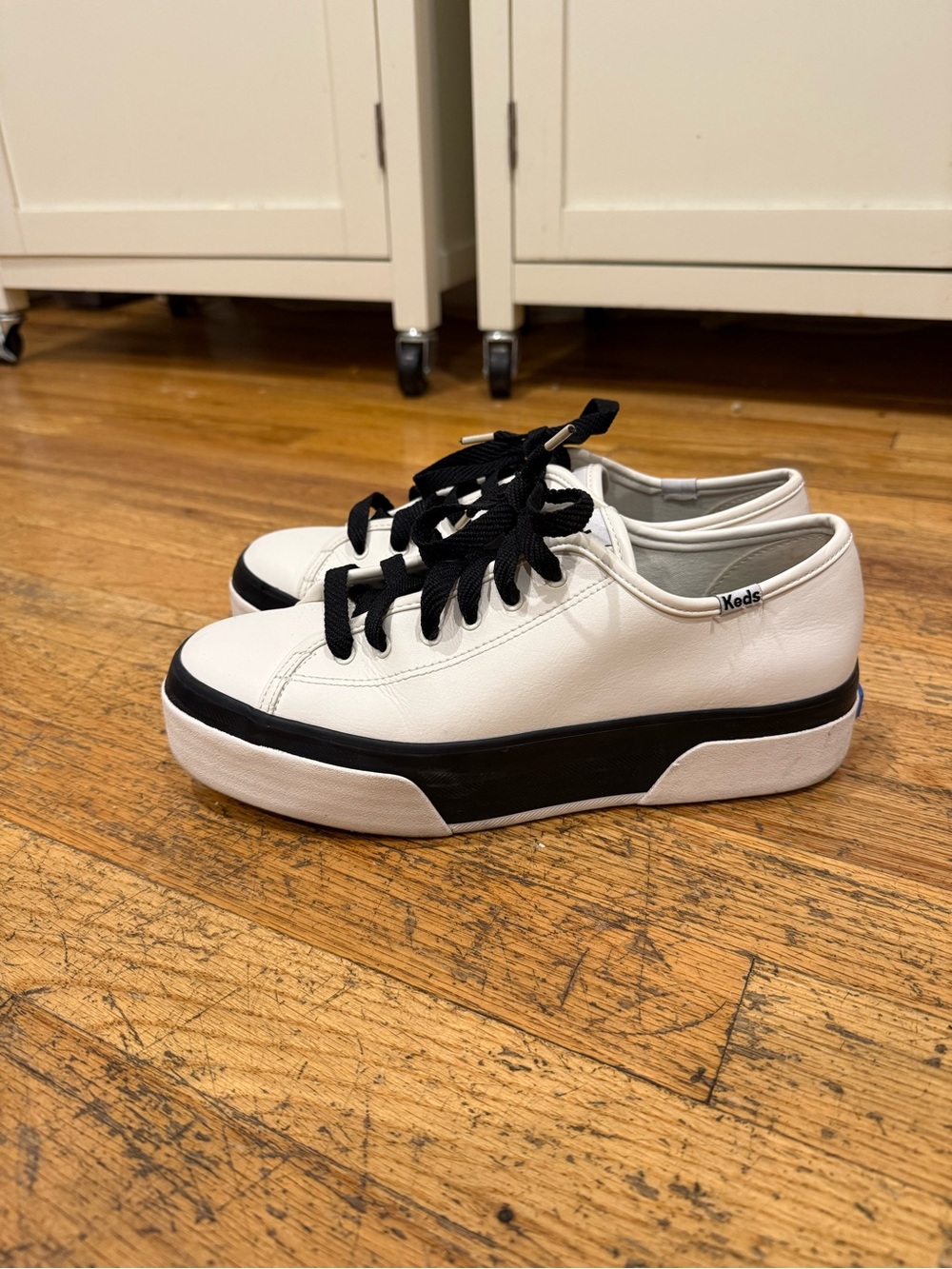 Keds Women’s White Sneakers with Black Trim and Laces